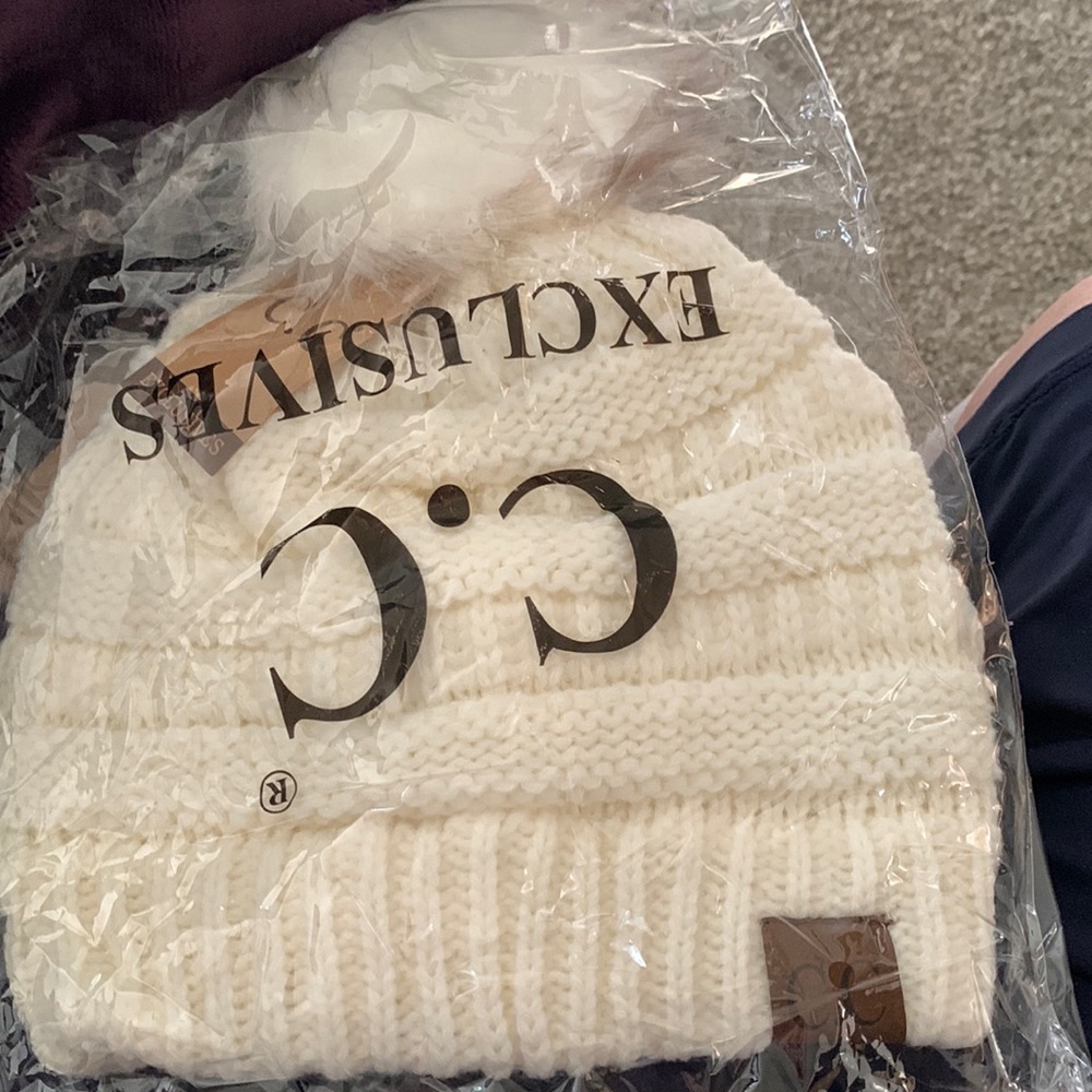 Cc hat cream with Pom Pom! Brand new in package